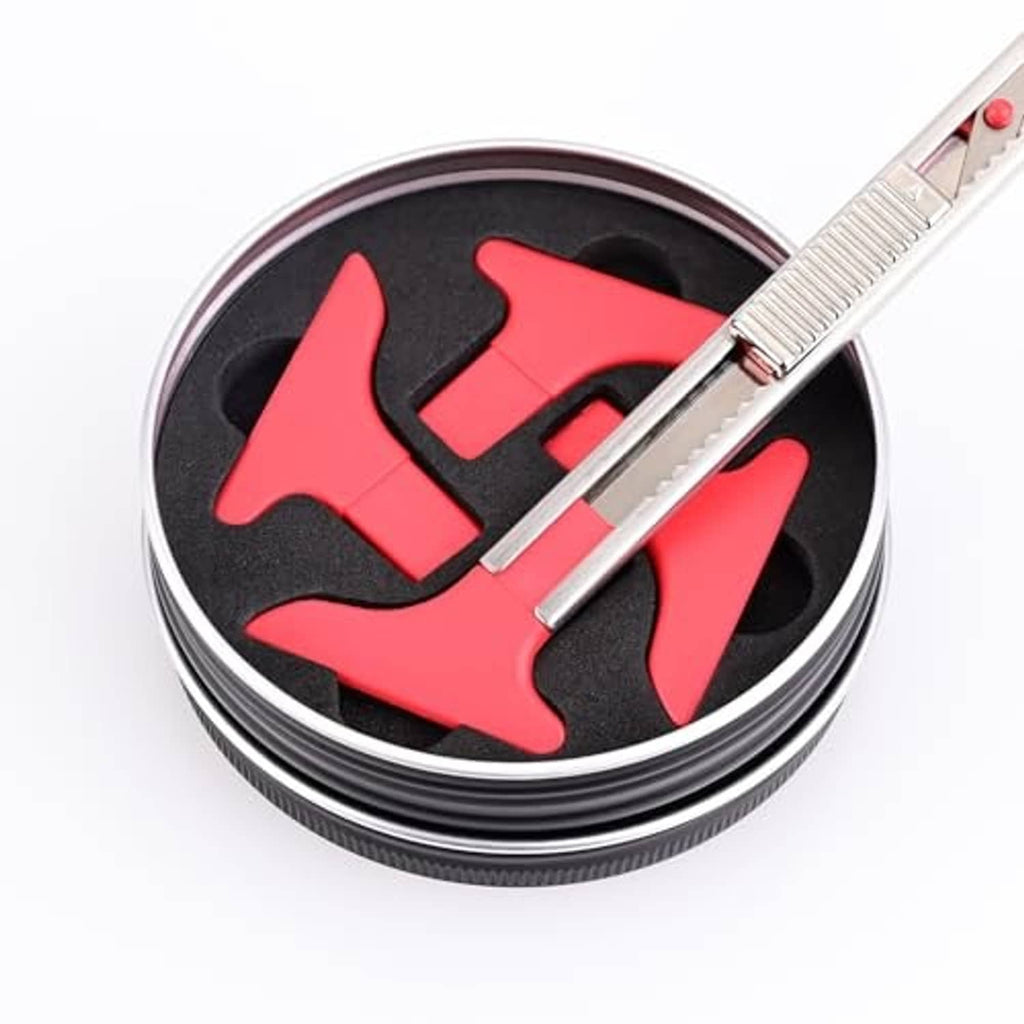 Vinyl wrap knife tucker tool with red/black insert and silver handle in round storage case