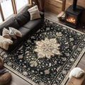 Washable area rug, rectangular black with ornate beige floral medallion pattern