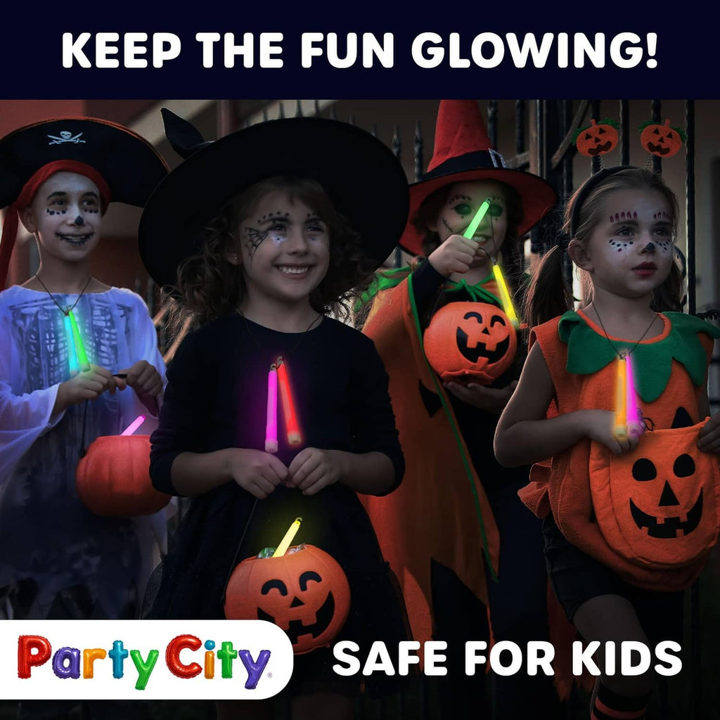 Glow sticks glowing in children’s hands for a Halloween night