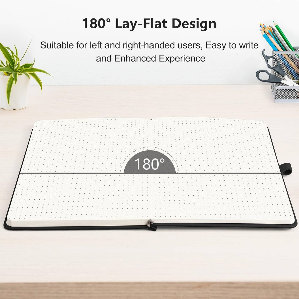 Black A5 dotted journal notebook laid flat showing 180-degree lay-flat design