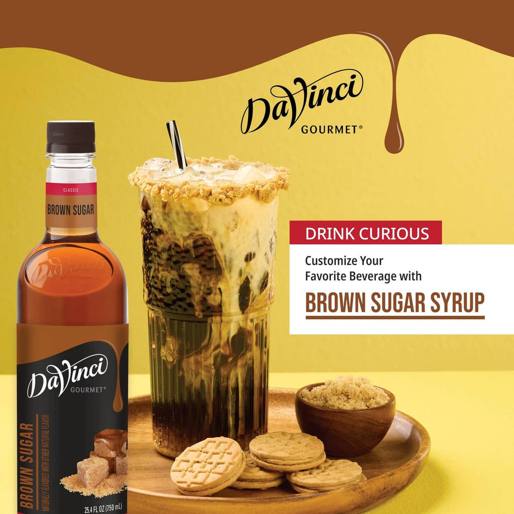 DaVinci Gourmet brown sugar syrup bottle beside tall iced drink and cookies