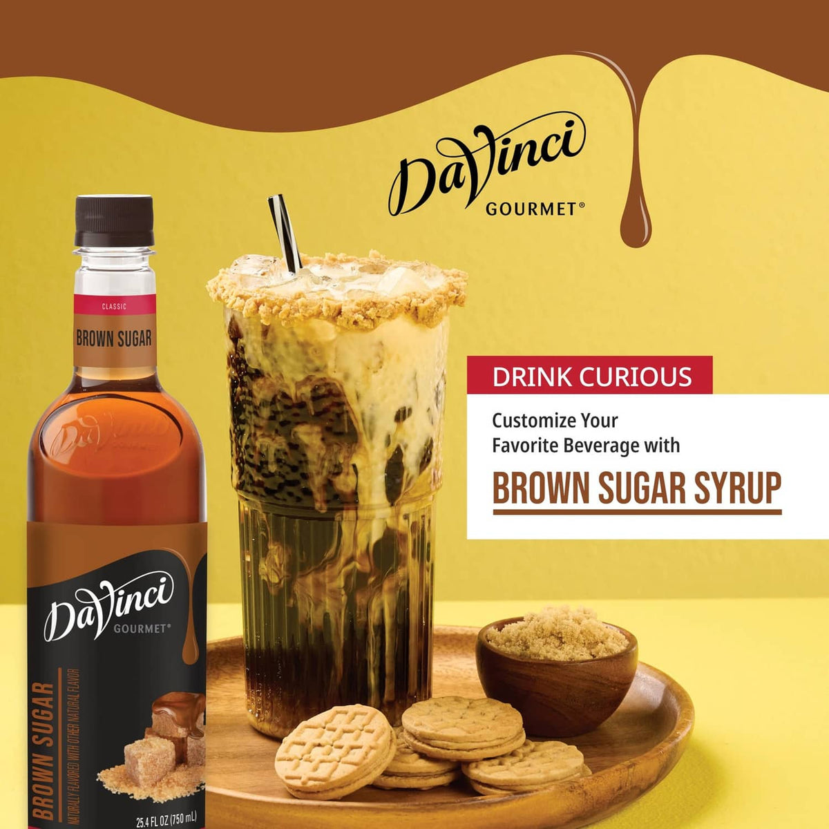 DaVinci Gourmet brown sugar syrup bottle beside tall iced drink and cookies