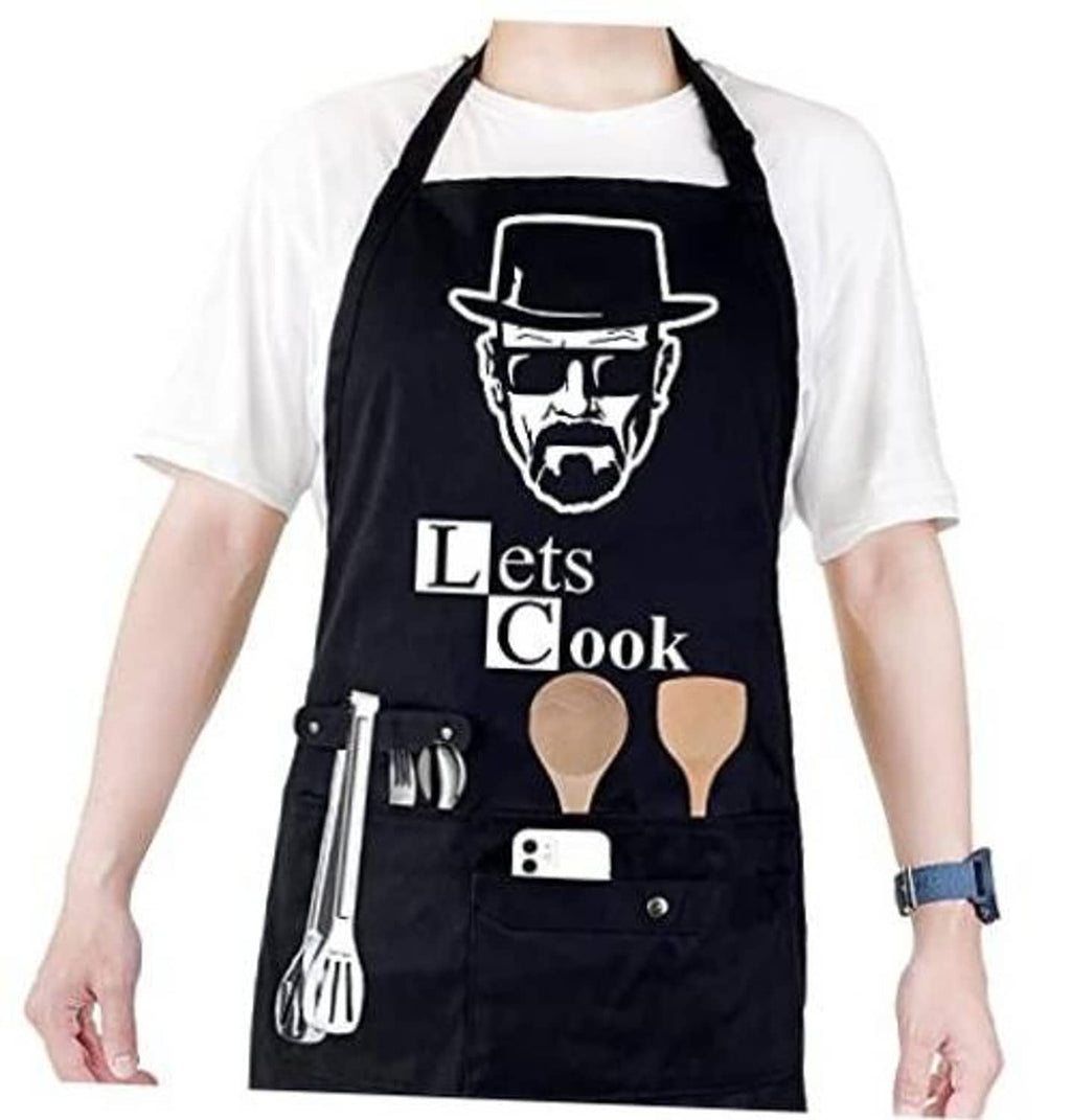 Black chef themed apron with "Let's Cook" print and front pockets