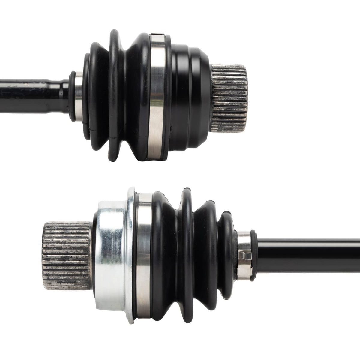 Close-up of black rubber boots and metal-capped shaft ends on drive coupler kit.