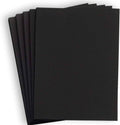 Black cardstock paper stack with square corners