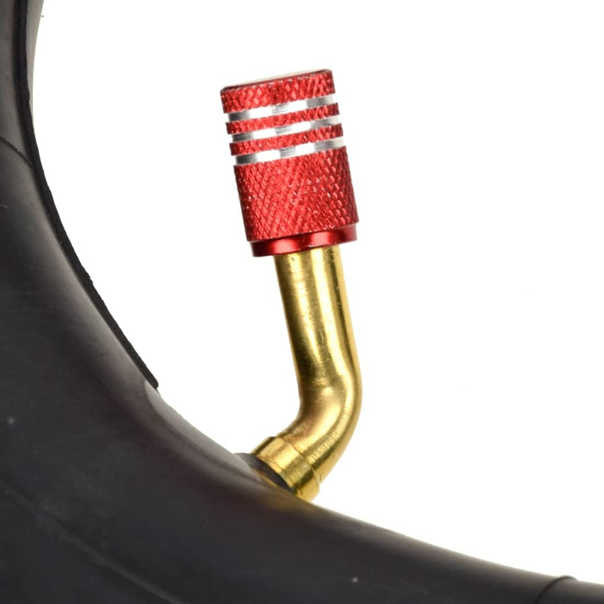Black inner tube valve stem with red band and gold tip