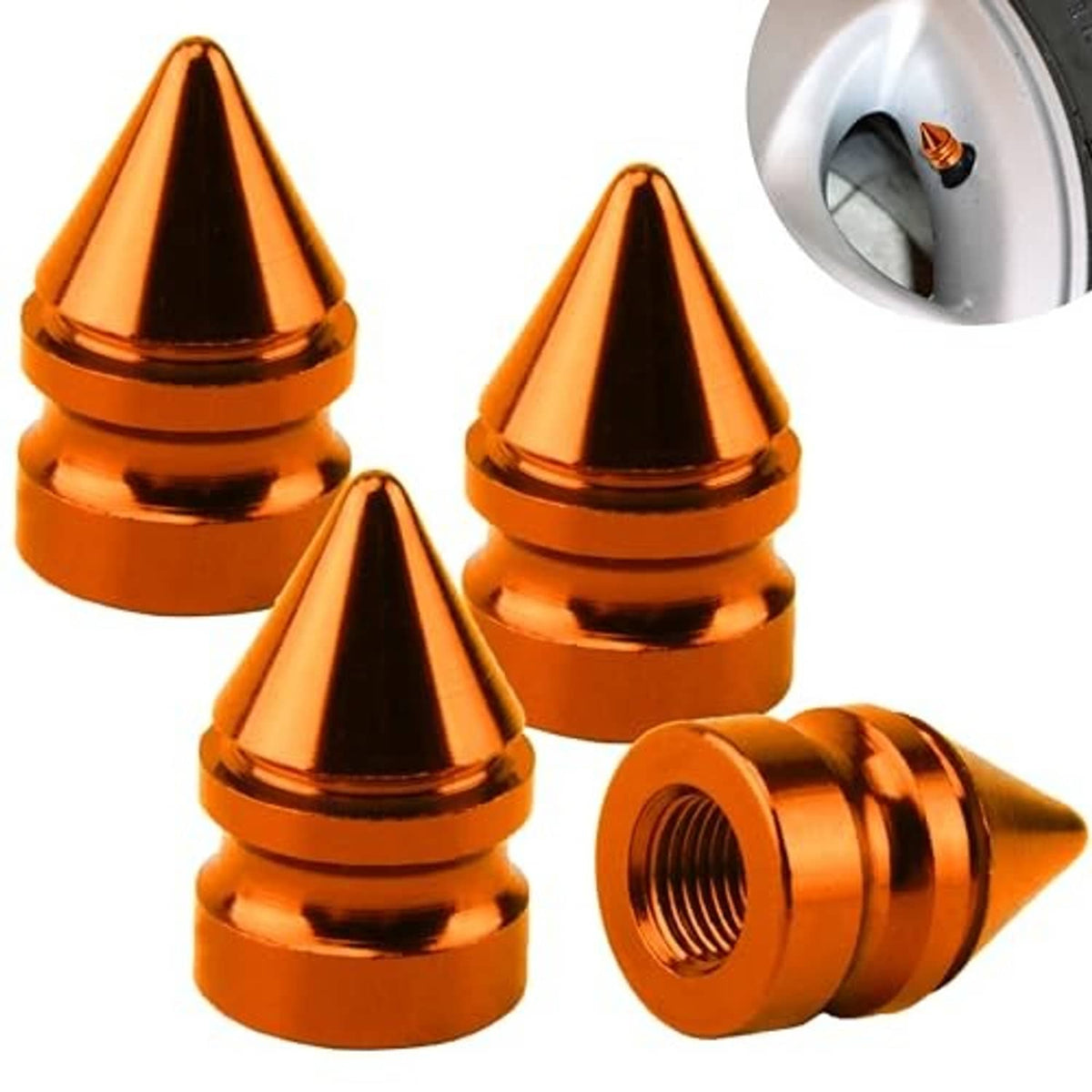 Orange spiked aluminum tire valve caps set of four; one cap shown on wheel valve stem