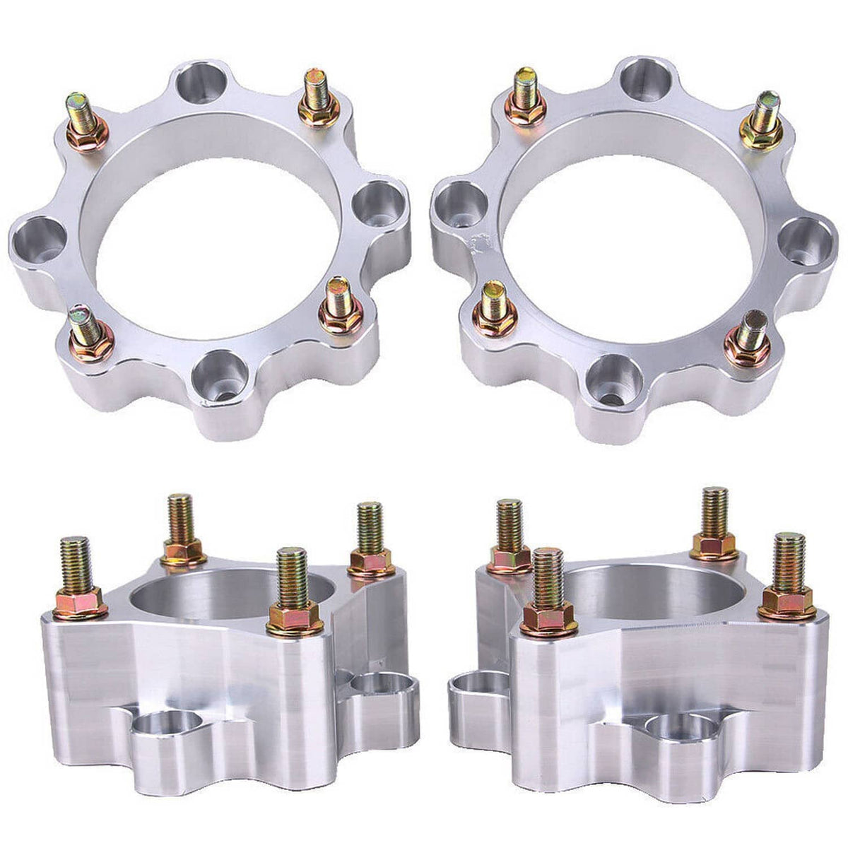 Two silver wheel spacers with studs and stacked spacer pieces, close-up view