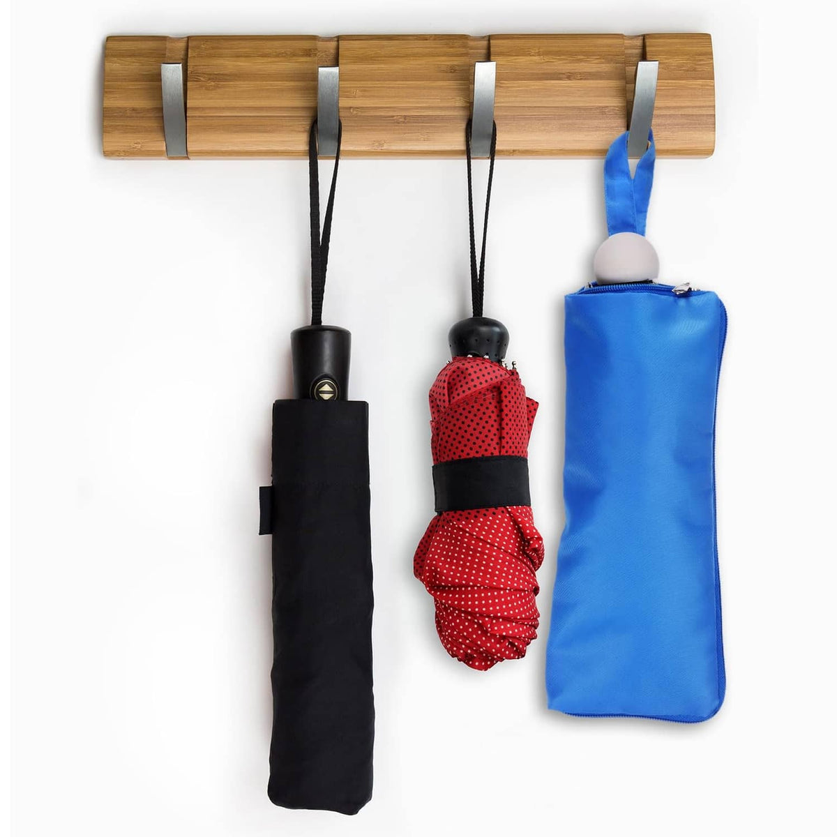 Umbrella carry bag with carry strap and zipper closure, hanging on hooks