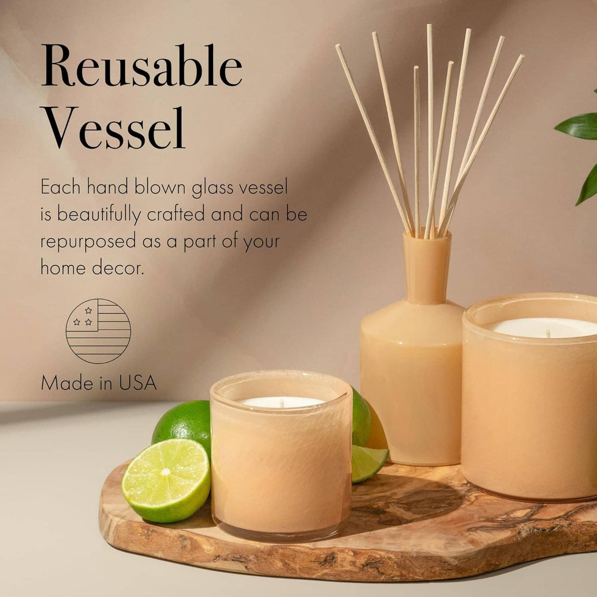Candles in hand-blown glass vessels with cotton wicks; reusable vessel display.