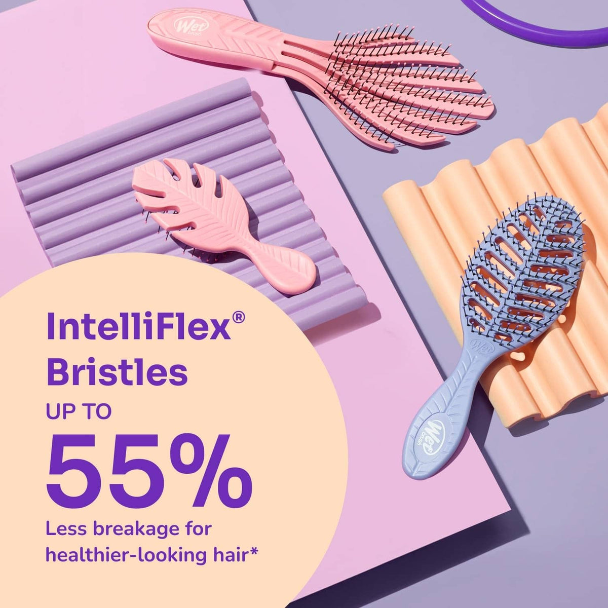 Pale pink IntelliFlex bristle detangler brush with flexible bristle rows