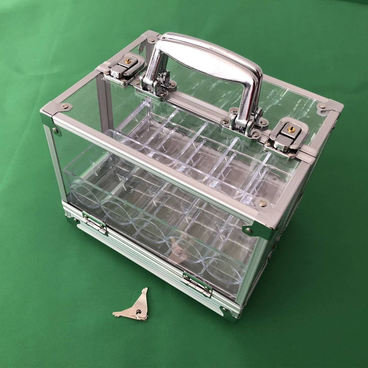 Clear acrylic poker chip carrier with metal latch, handle, and compartment dividers