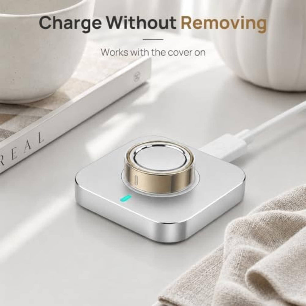 Clear ring cover on a charging base, ring stays covered during charging
