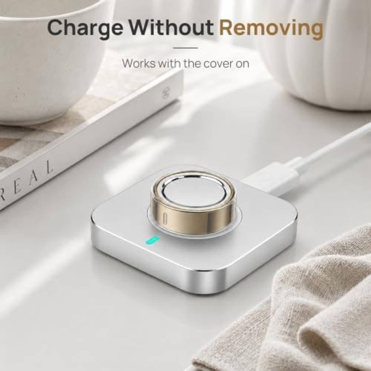 Clear ring cover on a charging base, ring stays covered during charging