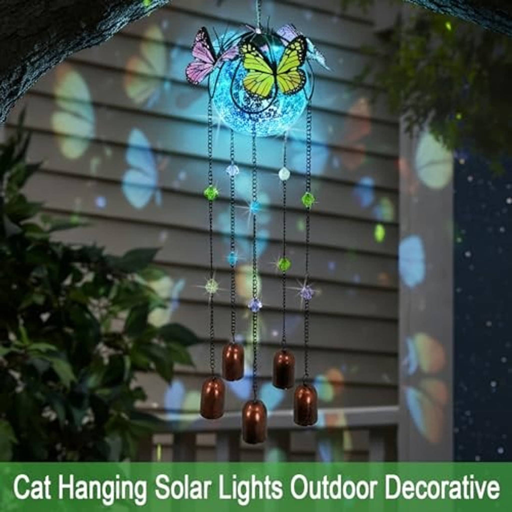 Butterfly wind chime solar light with blue orb, multicolor beads, and copper bell drops