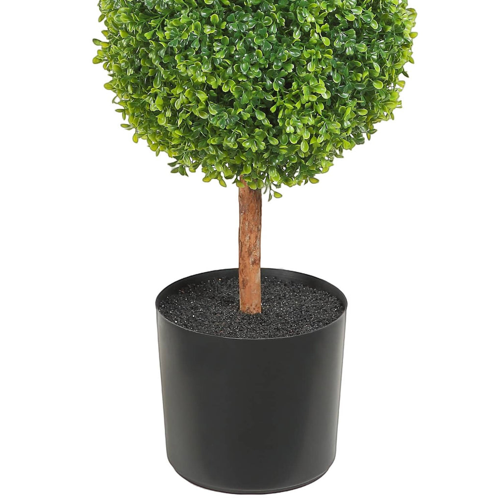 Artificial topiary tree in black round pot with bright green rounded canopy