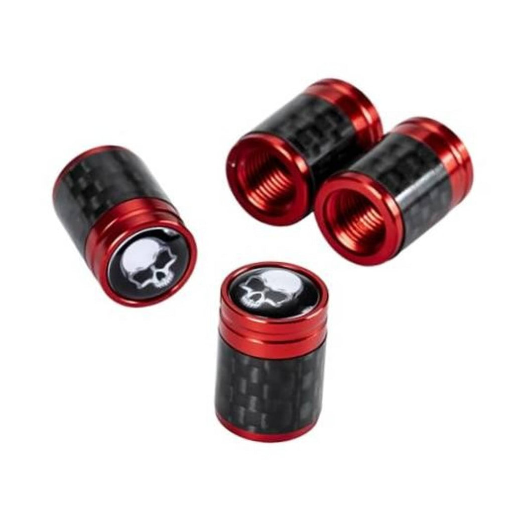 Red and black carbon fiber tire valve stem caps with skull emblem, 4-piece set.