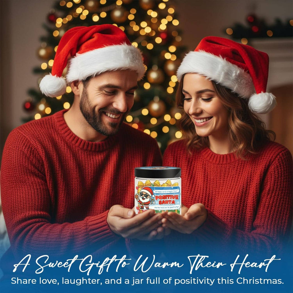 Couple in Santa hats holding Santa-themed affirmation card jar with black lid