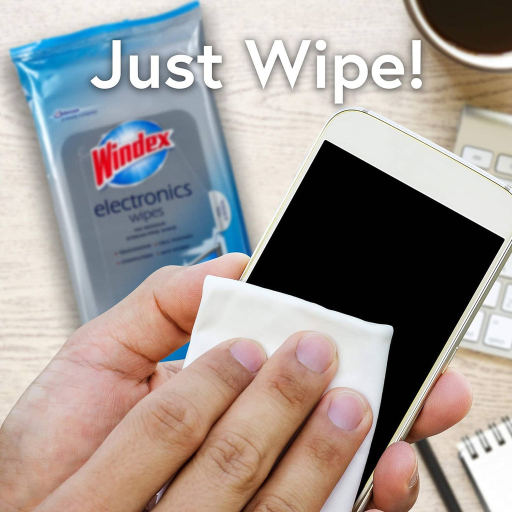 Pre-moistened wipe pressed on smartphone screen for smudge-free cleaning