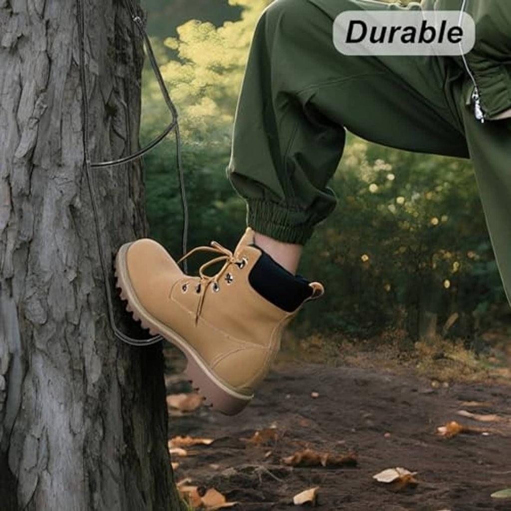 Climbing stick aider attached to a tree, with tan boot placed on the step