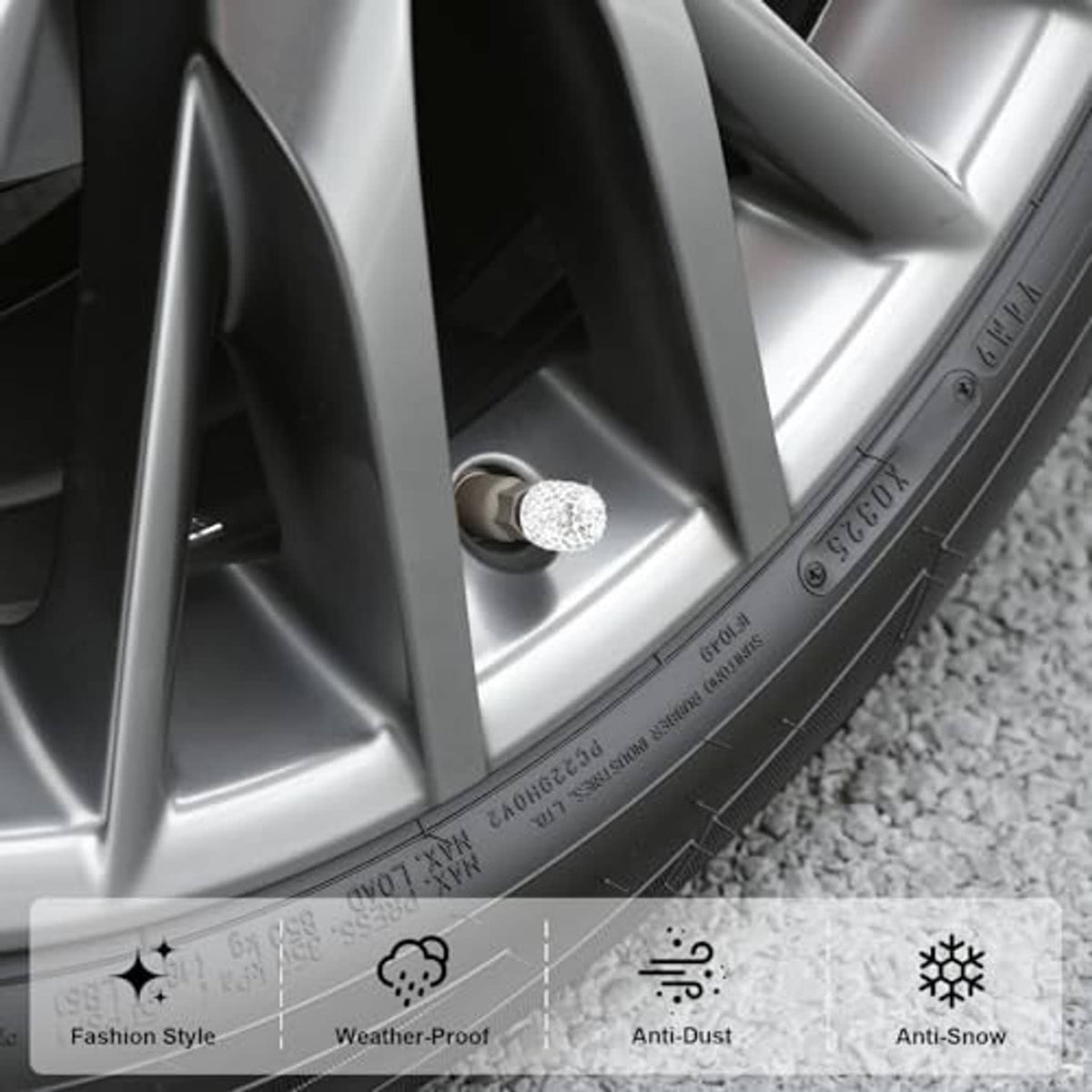 White crystal rhinestone valve stem cap on silver alloy wheel with black opening