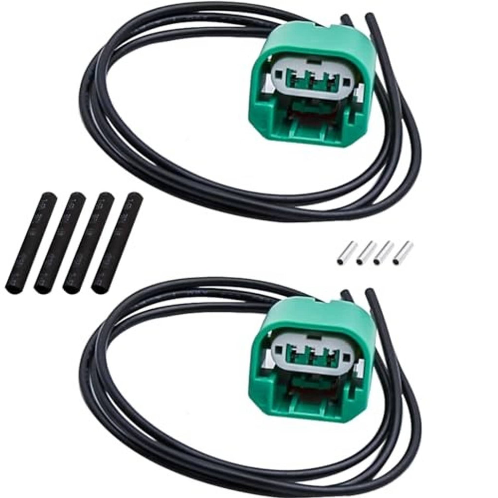 Headlight wiring harness set with two green connector plugs, black cables, and terminal parts