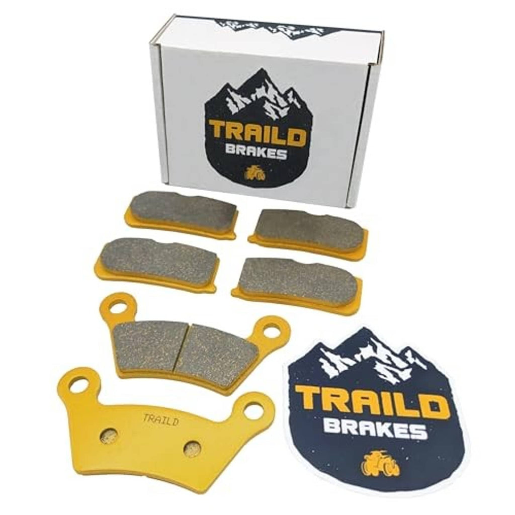 Ceramic brake pad set, gray pads with yellow backing plates, Trail Brakes logo