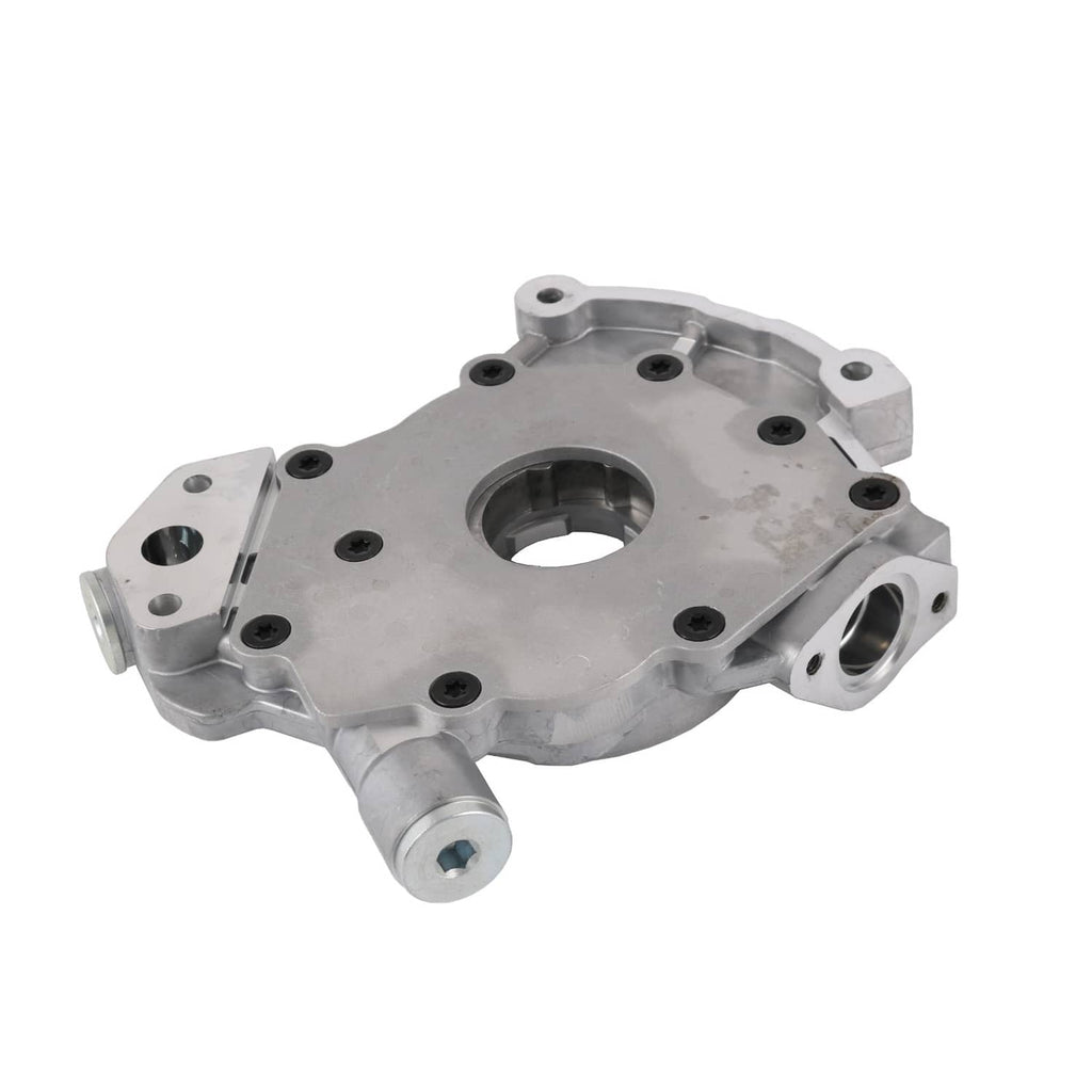 Oil pump housing with side outlet port, centered bore, and mounting holes on plate