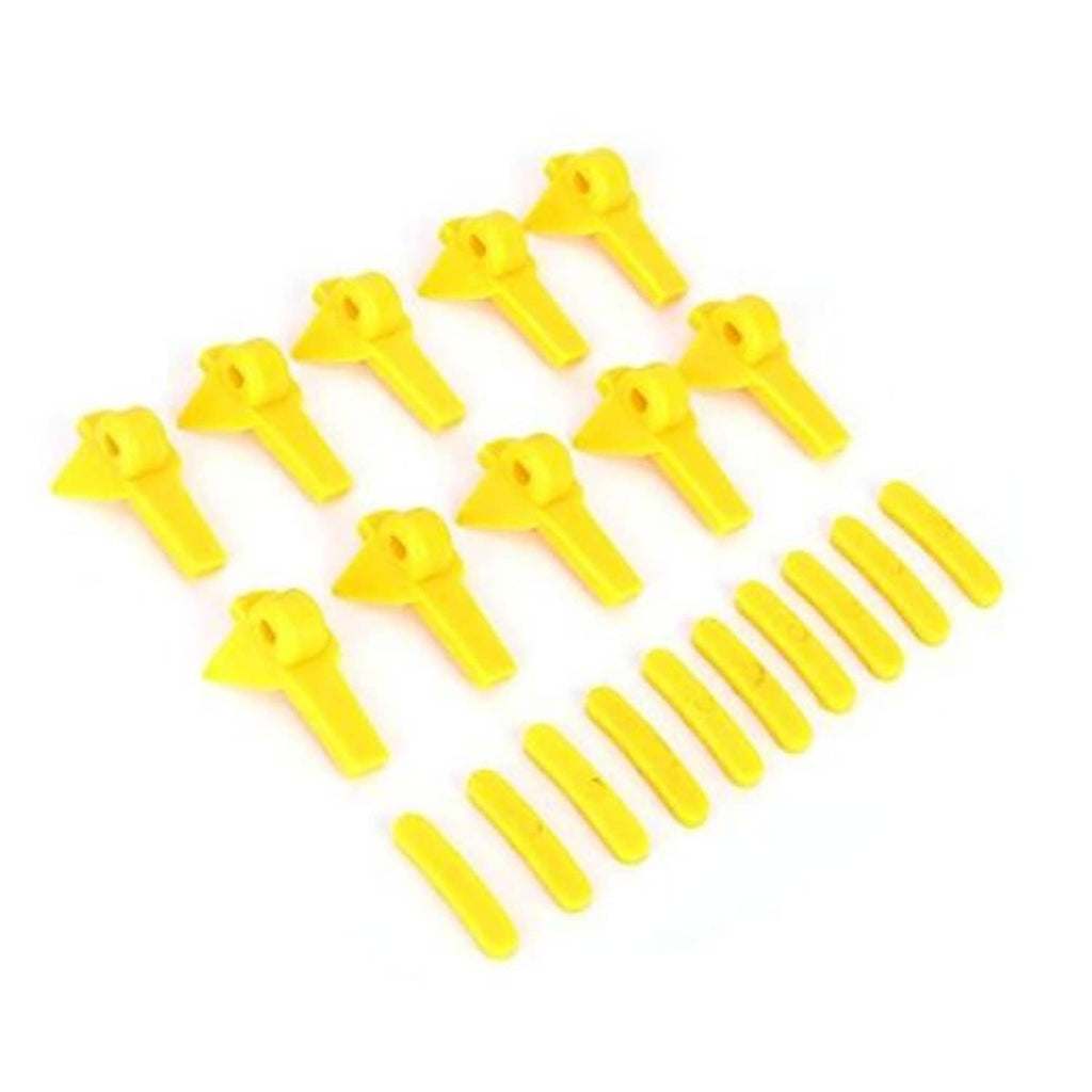 Set of 20 yellow tire changer head protectors and mounting inserts, molded plastic pieces