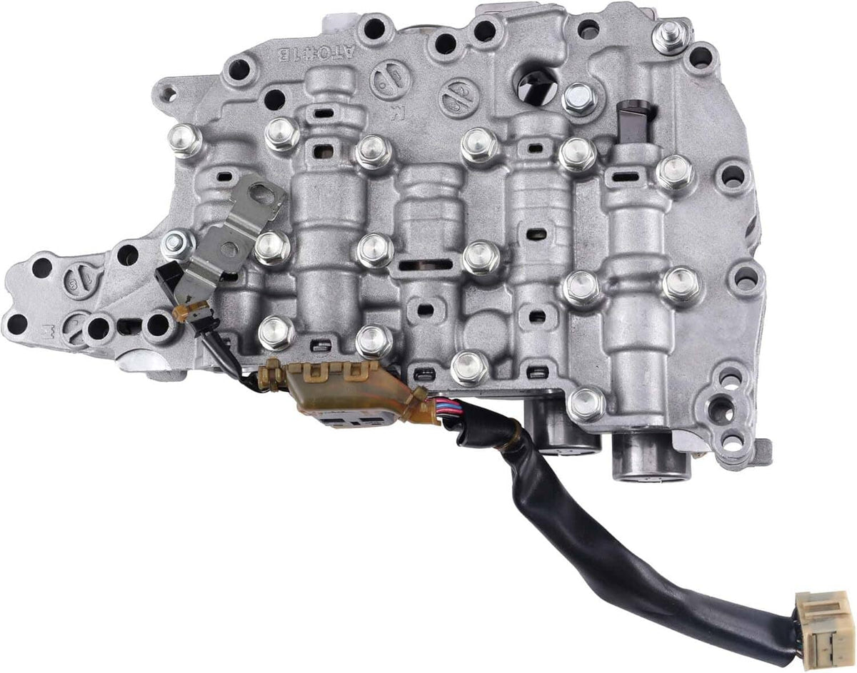 CVT transmission valve body with solenoid components, wiring harness leads, metal housing