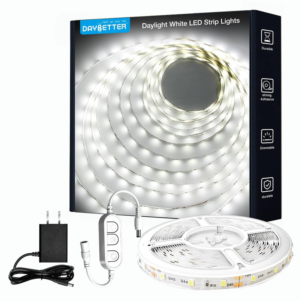 LED strip light kit with coiled white strip, controller, and power adapter