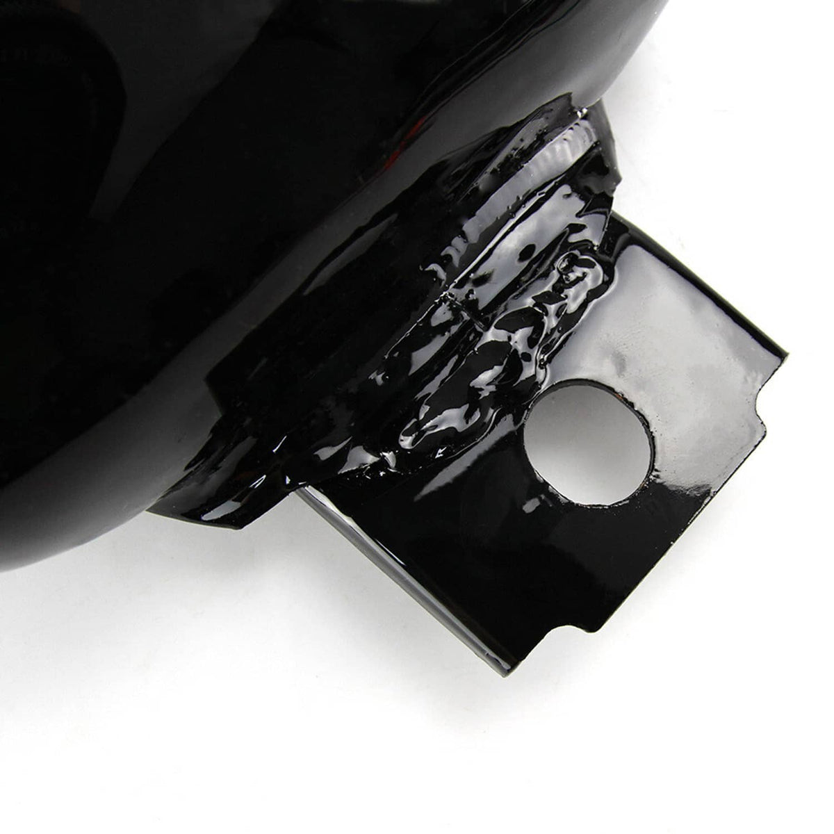 Black fuel tank underside with mounting bracket and round fuel outlet opening