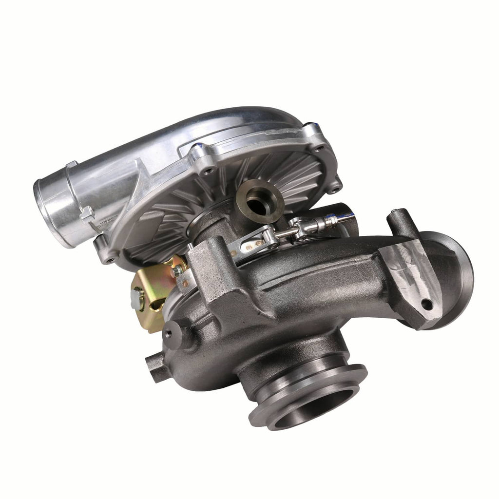 Turbocharger with cast body, side inlet tube, and internal turbine vanes