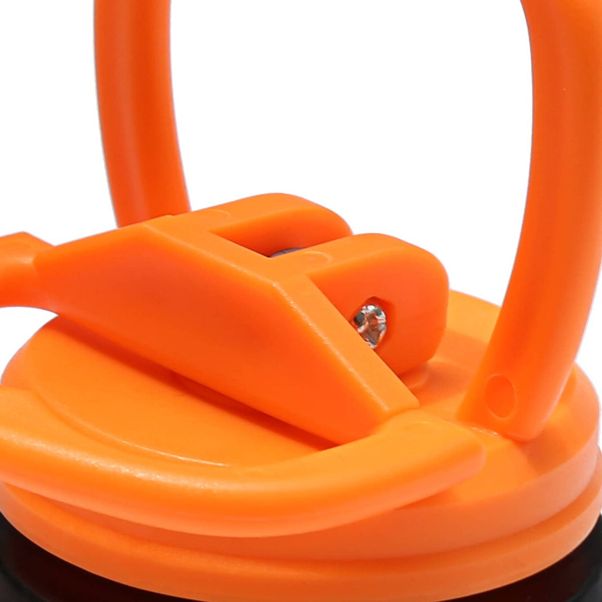 Close-up of orange dent puller suction tool with metal screw and black base edge