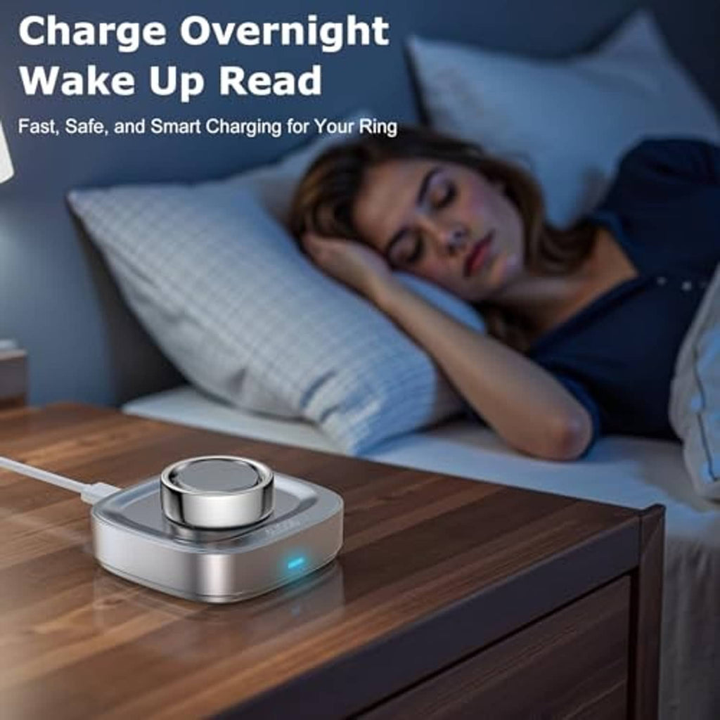 Silver ring charger on bedside table with glowing charging cradle