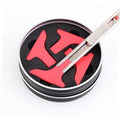 Vinyl wrap knife tucker tool with red/black insert and silver handle in round case