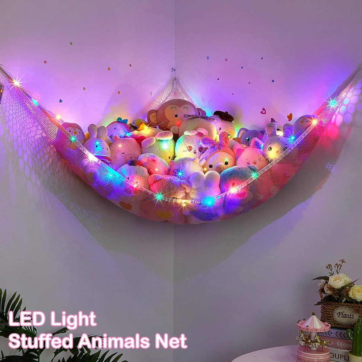 Close-up plush animal hammock net with bright multicolor LED lights glowing