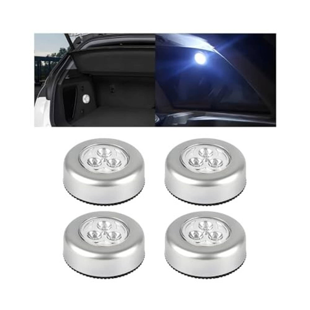 Set of four silver round LED dome puck lights, shown with bright beam