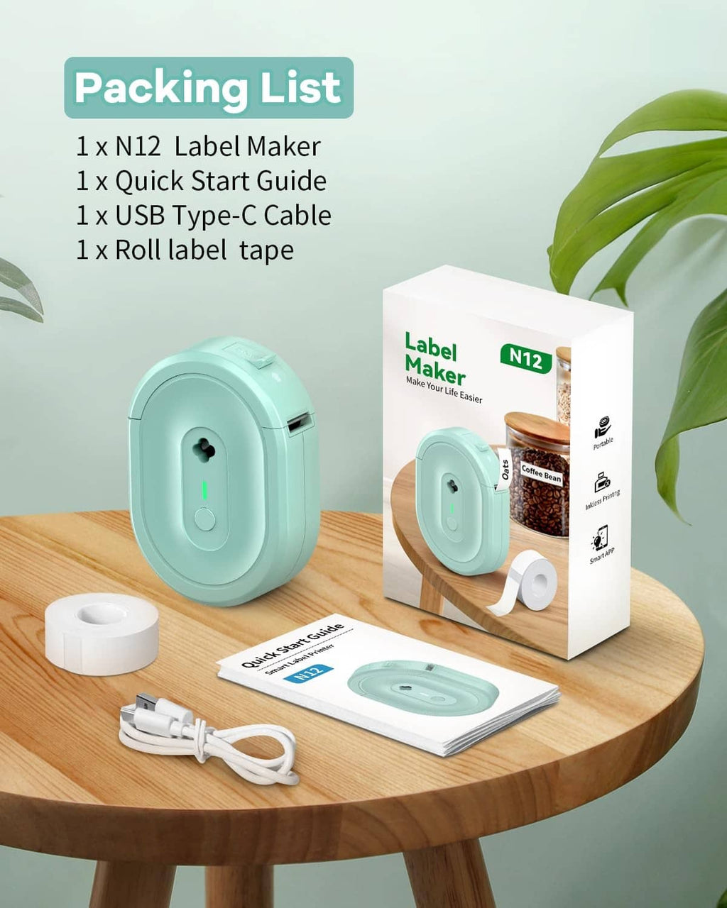 Turquoise N12 label maker box with accessories and label tape roll on table