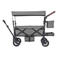 Double wagon stroller with dark gray canopy, two seats, and front storage pockets