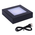 Square LED light stand base in black with glowing square window