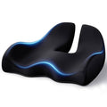 Black memory foam coccyx seat cushion with contoured channel and breathable fabric cover