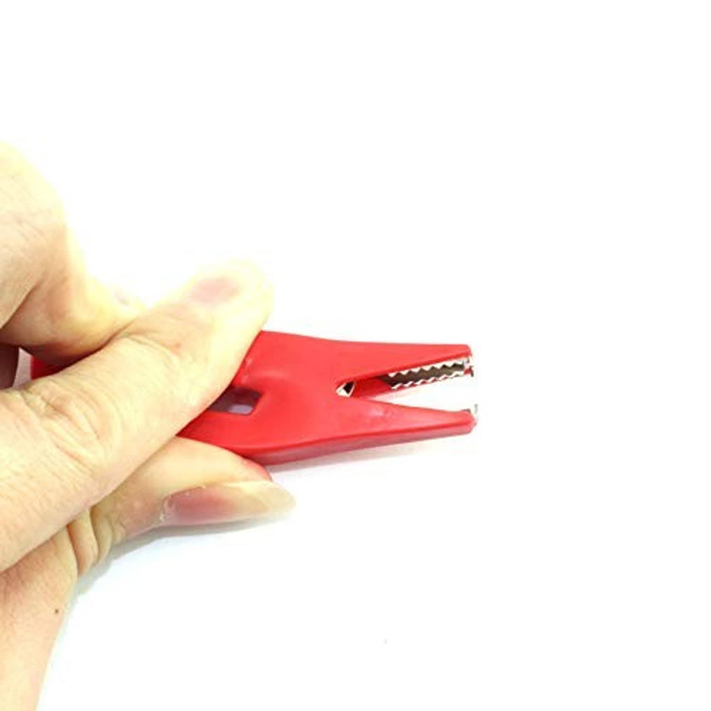 Hand-held red insulated alligator clip protector with metal teeth, battery test lead cover
