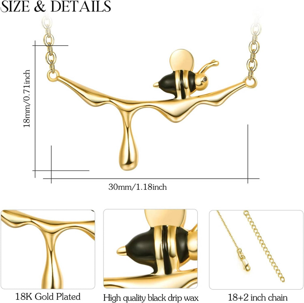 Bee pendant necklace with gold-tone finish, black enamel body, and linked chain