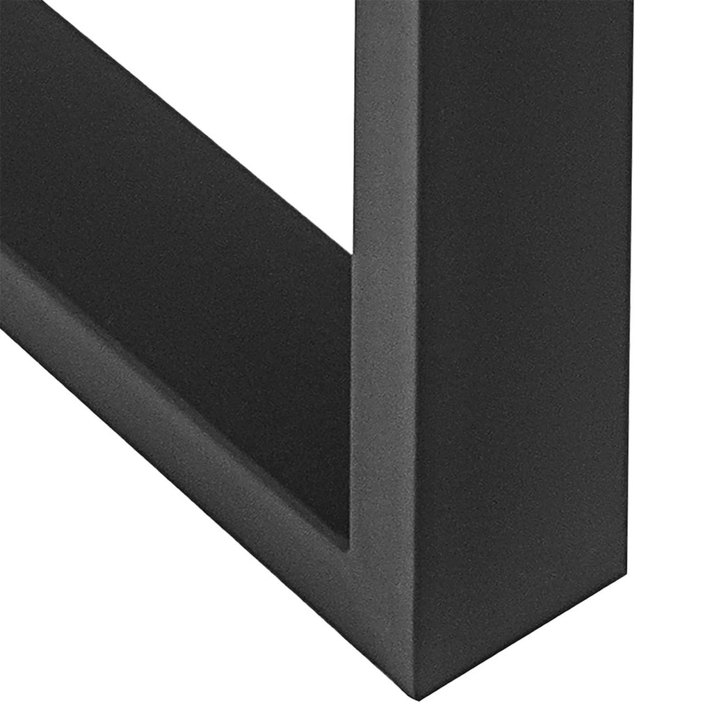 Close-up of black metal table leg frame corner, smooth powder-coated finish