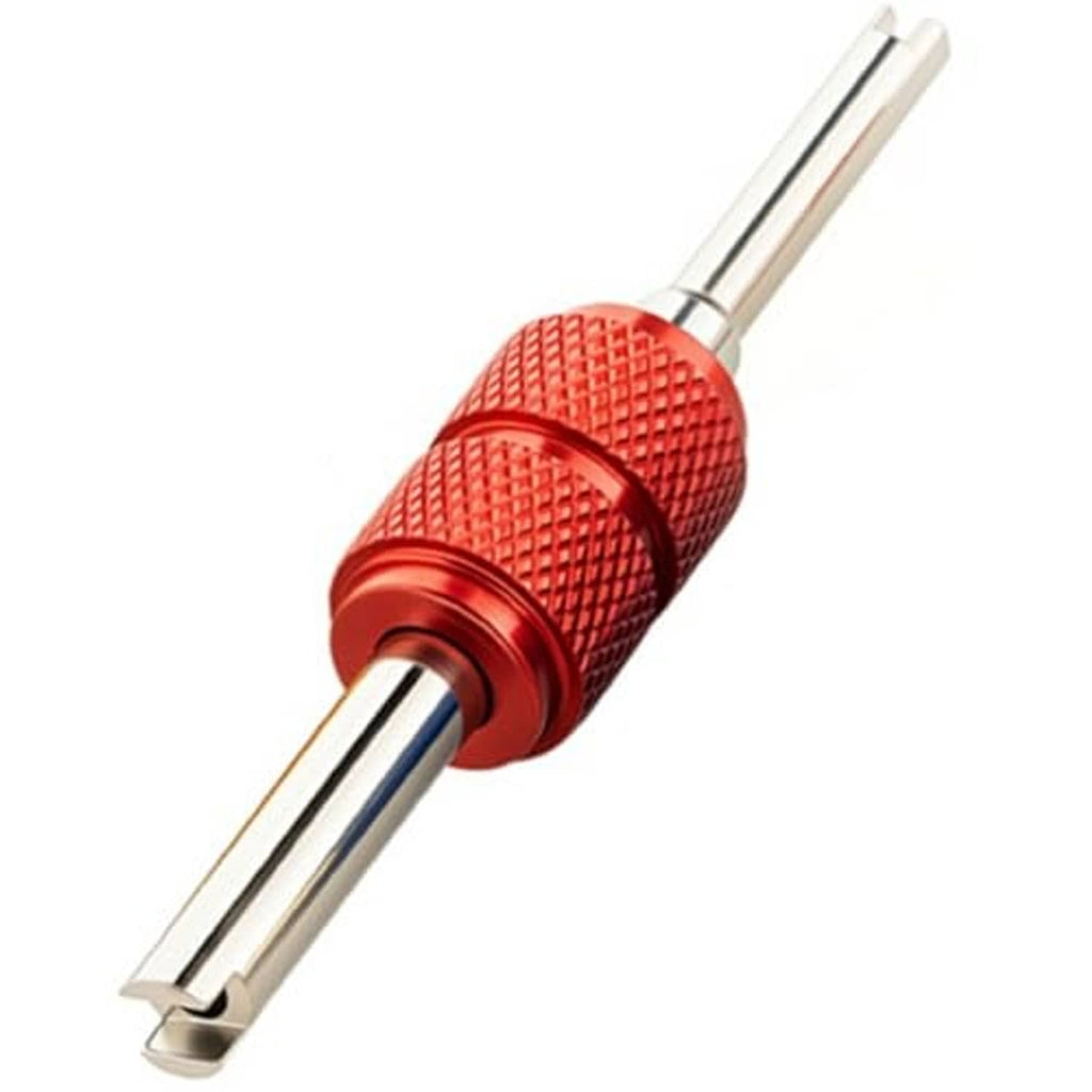 Red knurled valve core wrench with dual metal prongs and protective sleeve