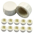 White PVC female-thread end caps, two shown with threaded openings and protective covers