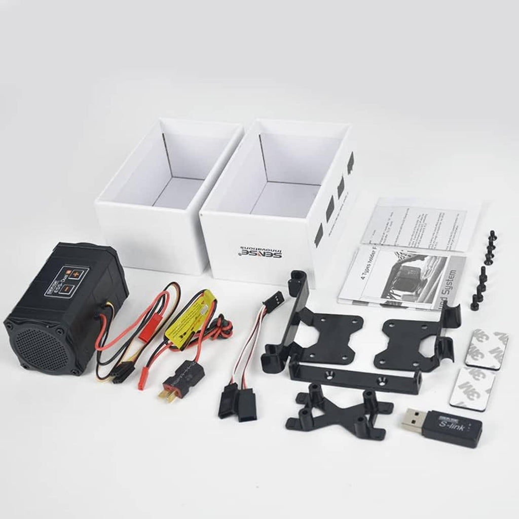 Sound simulator kit contents: black speaker module, wiring harness, brackets and hardware