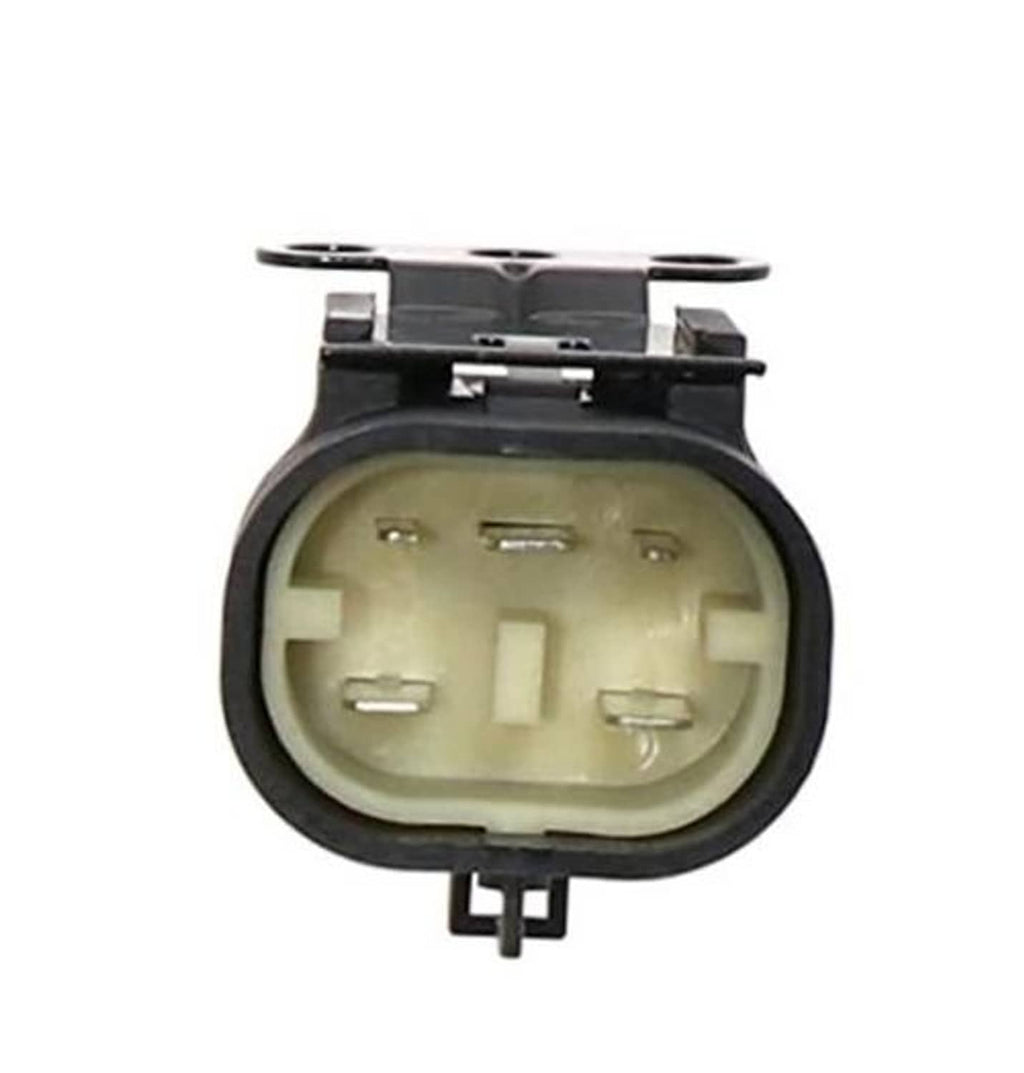 Electrical relay with black housing and circular beige contact block, bottom pins visible