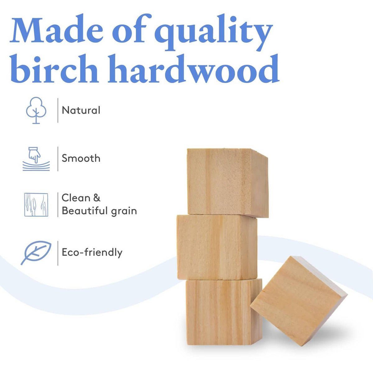 Stacked natural birch wood cube blocks with smooth faces, plus a single cube